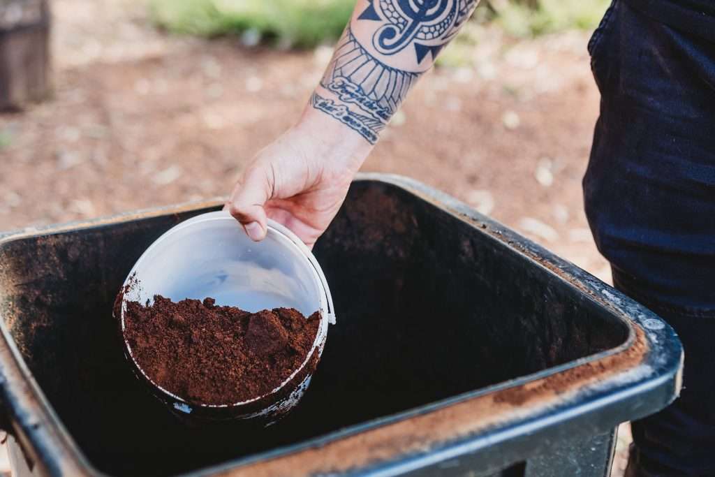 Take home free coffee grounds to use at home or in the garden